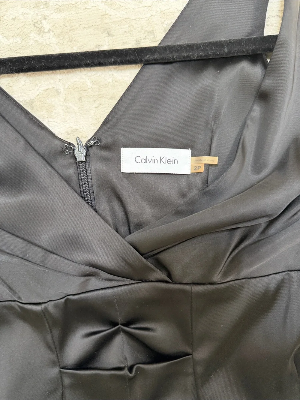 Calvin Klein Black Sleeveless V-Neck short fitted Dress with Front Bow Detail